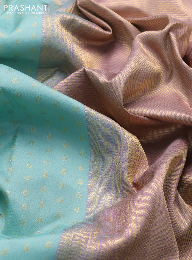 Pure kanchipuram silk saree pastel blue and grey shade with allover zari woven 1000 buttas and temple design simple korvai border