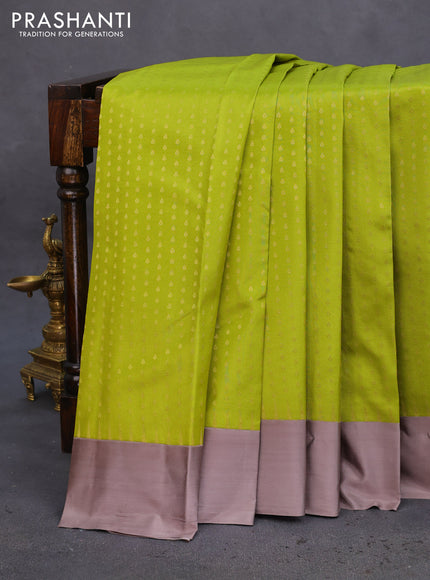 Pure kanchipuram silk saree light green and grey shade with allover zari woven 1000 buttas and temple design simple korvai border