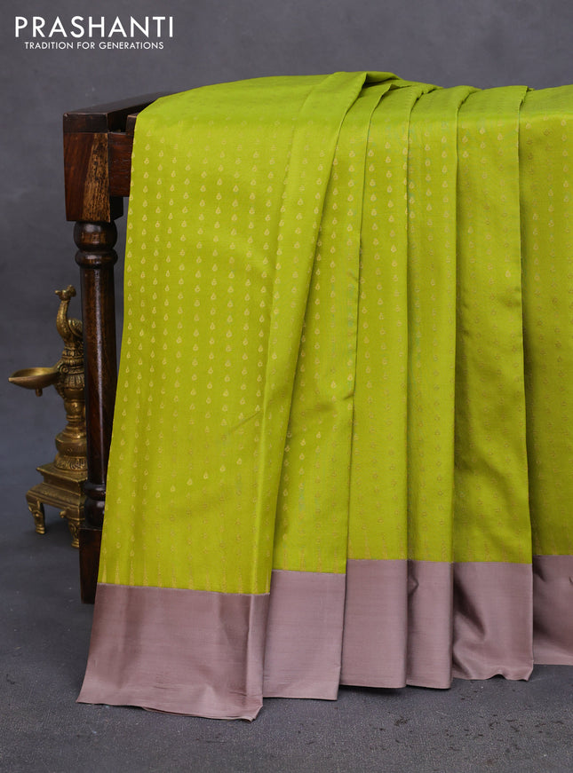 Pure kanchipuram silk saree light green and grey shade with allover zari woven 1000 buttas and temple design simple korvai border