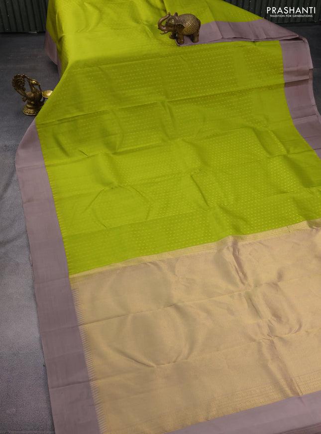 Pure kanchipuram silk saree light green and grey shade with allover zari woven 1000 buttas and temple design simple korvai border