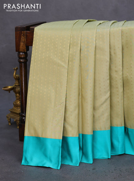 Pure kanchipuram silk saree pastel green and teal blue with allover zari woven 1000 buttas and temple design simple korvai border