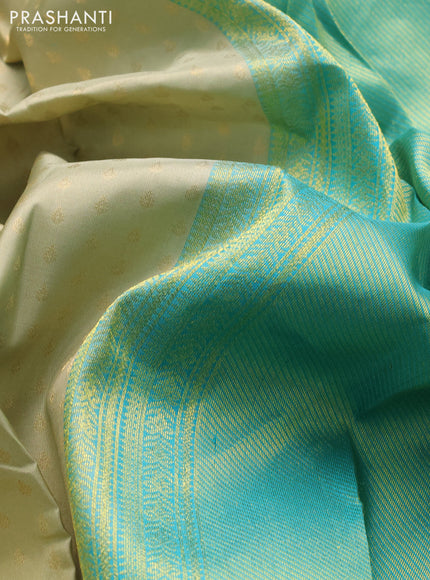 Pure kanchipuram silk saree pastel green and teal blue with allover zari woven 1000 buttas and temple design simple korvai border