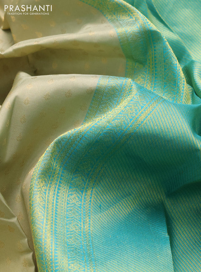 Pure kanchipuram silk saree pastel green and teal blue with allover zari woven 1000 buttas and temple design simple korvai border
