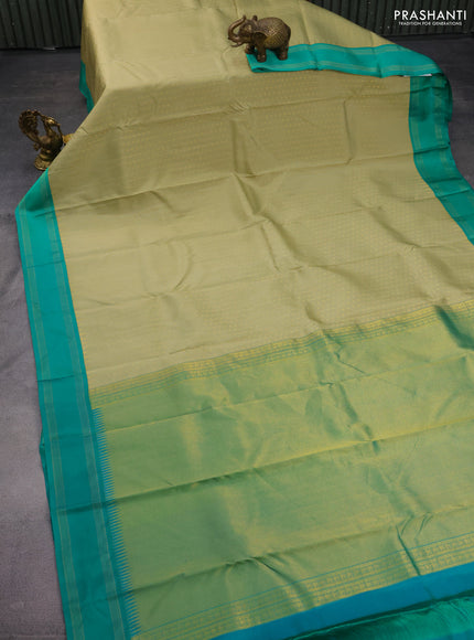 Pure kanchipuram silk saree elaichi green and teal green with allover zari woven 1000 buttas and temple design simple korvai border