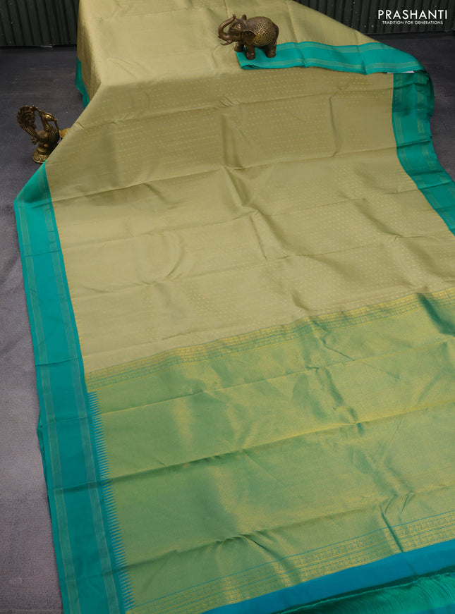 Pure kanchipuram silk saree elaichi green and teal green with allover zari woven 1000 buttas and temple design simple korvai border