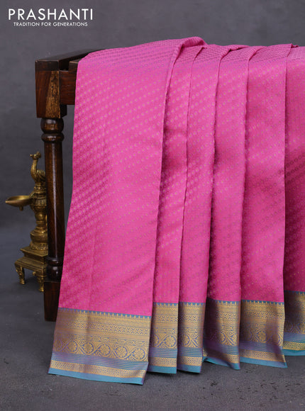 Pure kanchipuram silk saree mauve pink and dual shade of teal blue with allover self emboss & zari buttas and zari woven border