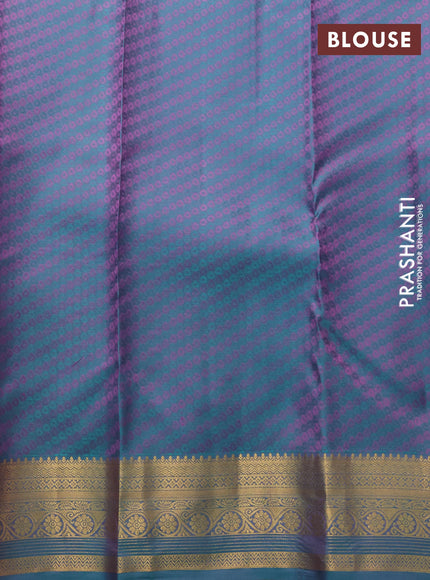 Pure kanchipuram silk saree mauve pink and dual shade of teal blue with allover self emboss & zari buttas and zari woven border