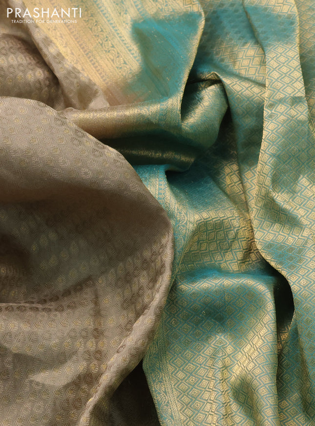 Pure kanchipuram silk saree beige and teal green with allover self emboss & zari buttas and zari woven border
