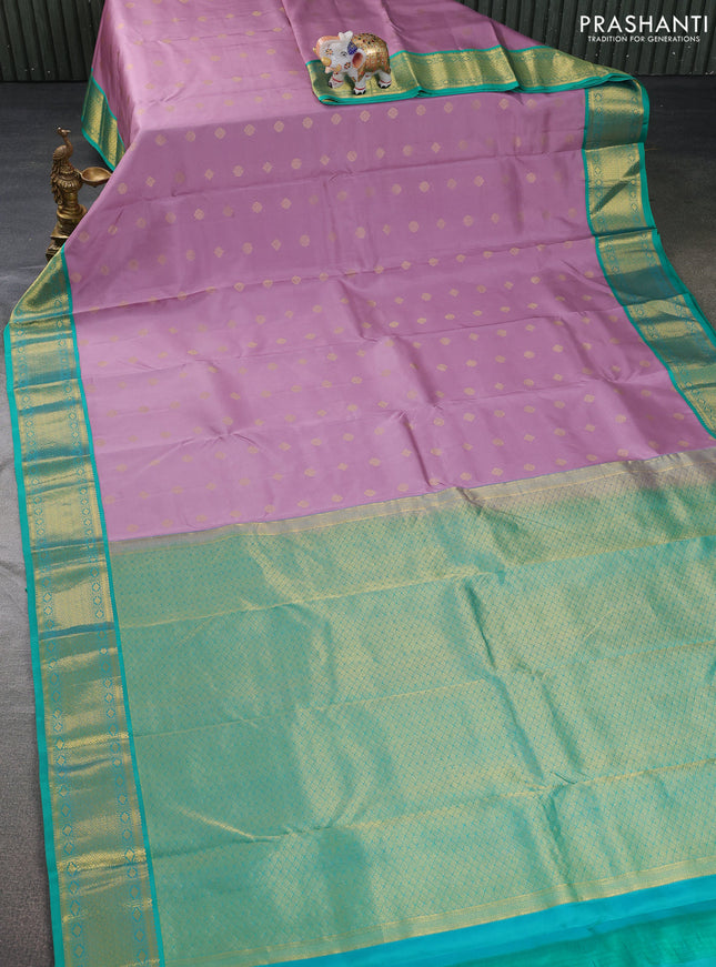 Pure kanchipuram silk saree mild purple and teal green with zari woven buttas and zari woven korvai border