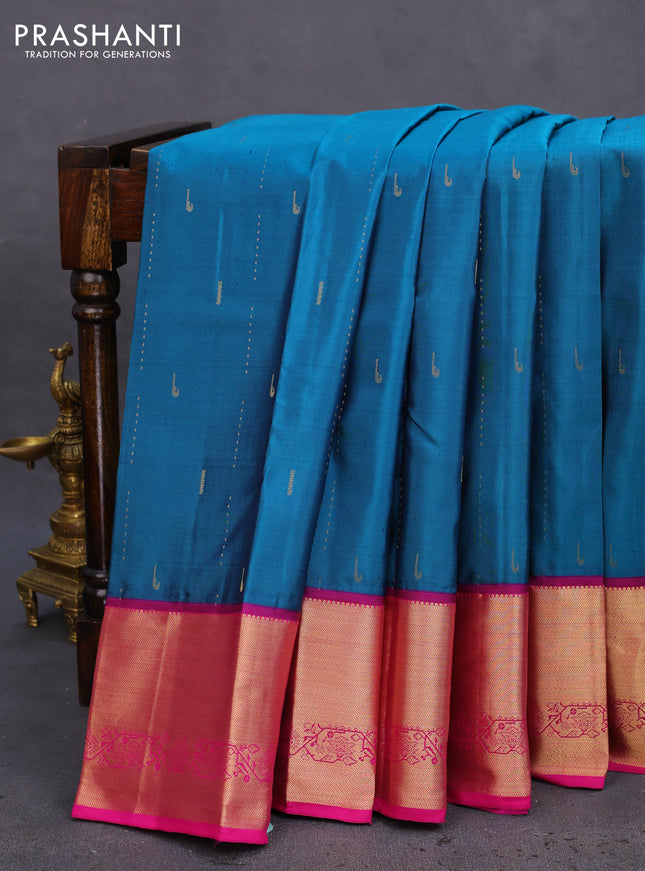 Pure kanchipuram silk saree peacock green and pink with allover zari woven muniya buttas and rich zari woven border