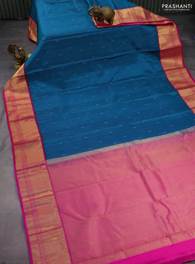Pure kanchipuram silk saree peacock green and pink with allover zari woven muniya buttas and rich zari woven border