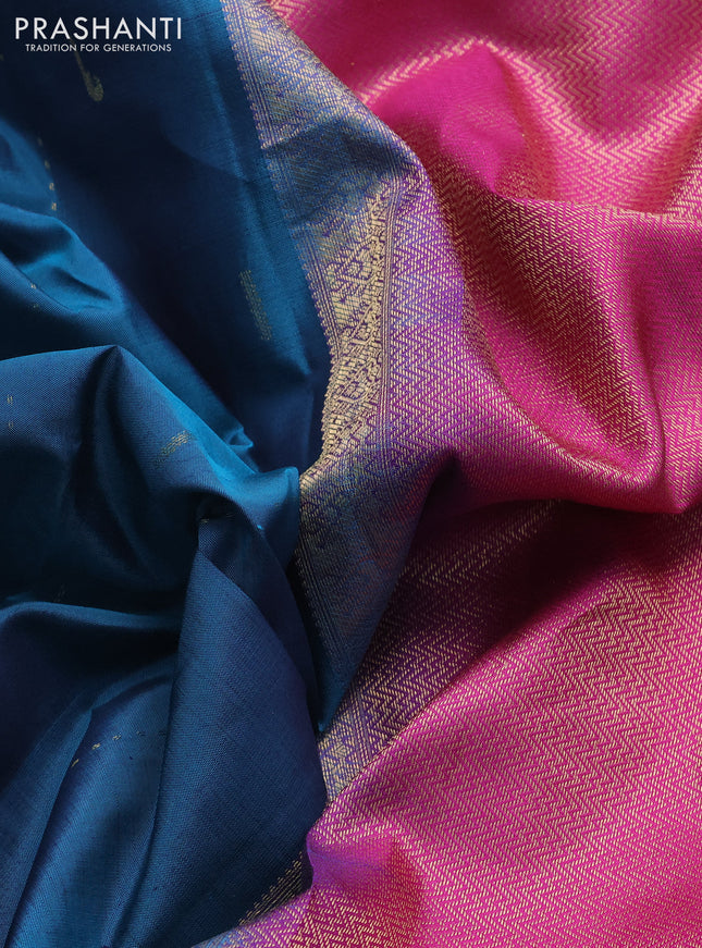 Pure kanchipuram silk saree peacock green and pink with allover zari woven muniya buttas and rich zari woven border