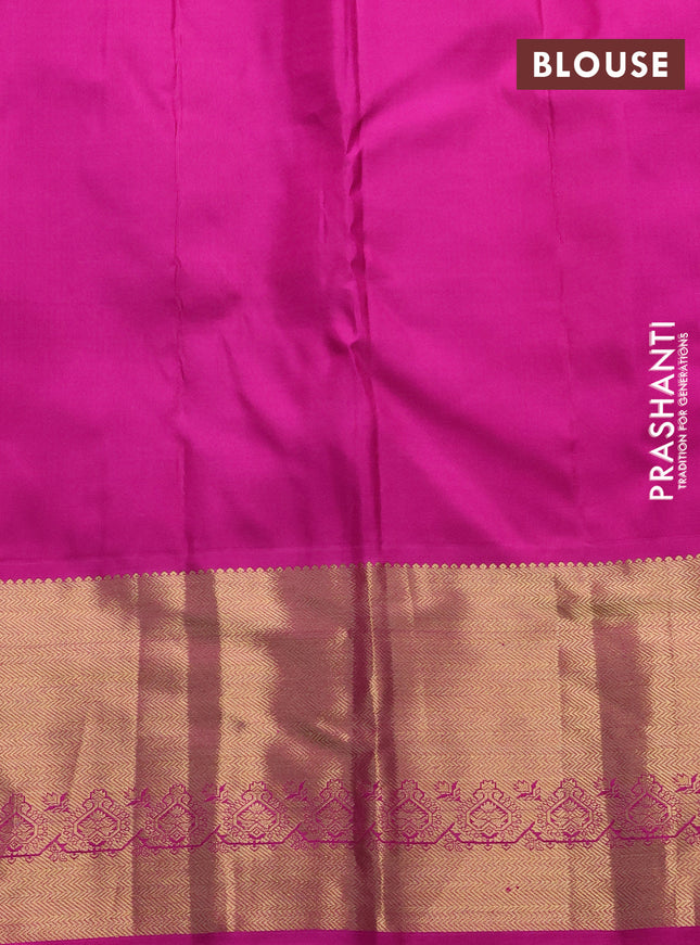 Pure kanchipuram silk saree peacock green and pink with allover zari woven muniya buttas and rich zari woven border