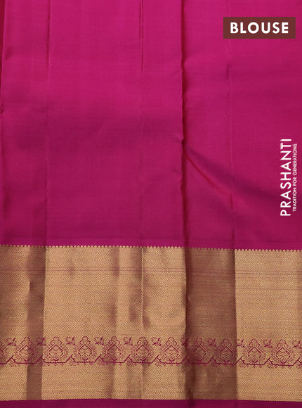 Pure kanchipuram silk saree dual shade of green and magenta pink with allover zari woven muniya buttas and rich zari woven border
