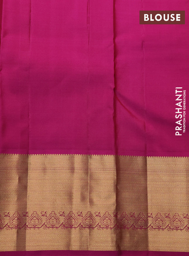 Pure kanchipuram silk saree dual shade of green and magenta pink with allover zari woven muniya buttas and rich zari woven border