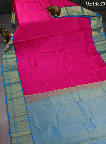 Pure kanchipuram silk saree pink and dual shade of teal blue with allover zari woven muniya buttas and rich zari woven border