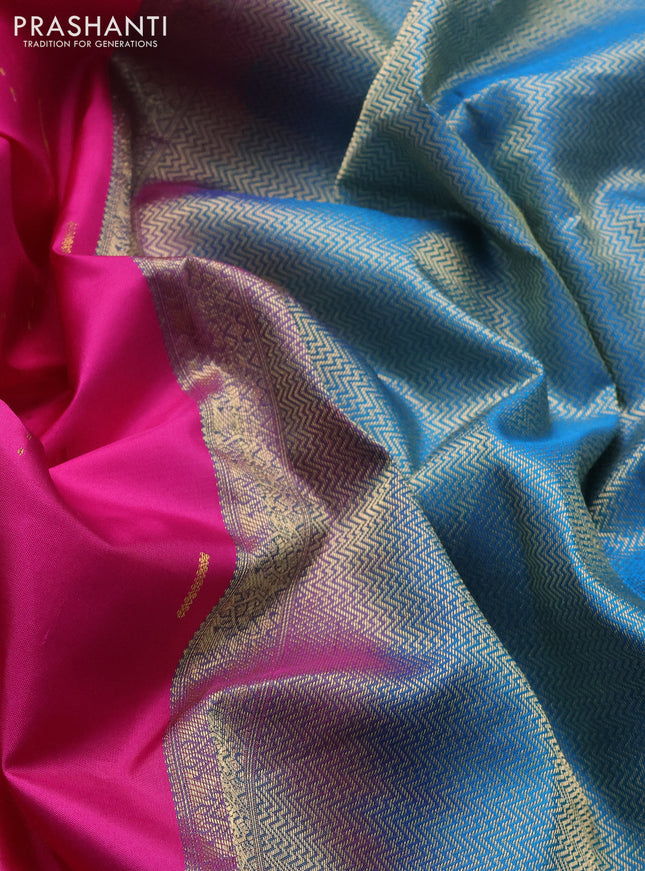 Pure kanchipuram silk saree pink and dual shade of teal blue with allover zari woven muniya buttas and rich zari woven border
