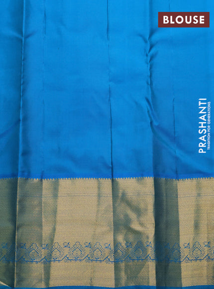 Pure kanchipuram silk saree pink and dual shade of teal blue with allover zari woven muniya buttas and rich zari woven border