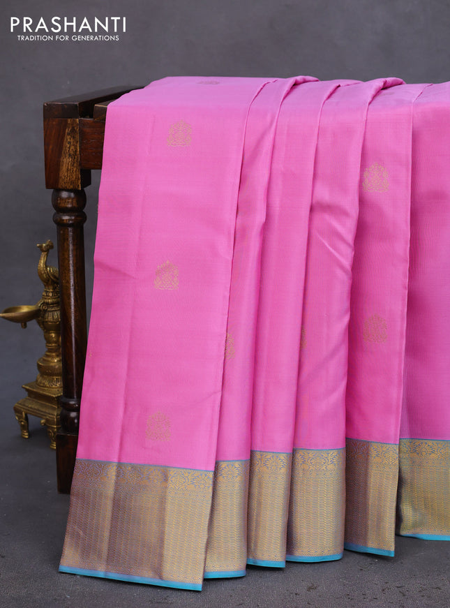Pure kanchipuram silk saree light pink and teal blue with allover zari woven buttas and rich zari woven border