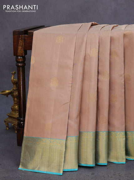 Pure kanchipuram silk saree beige and teal blue with allover zari woven buttas and rich zari woven border