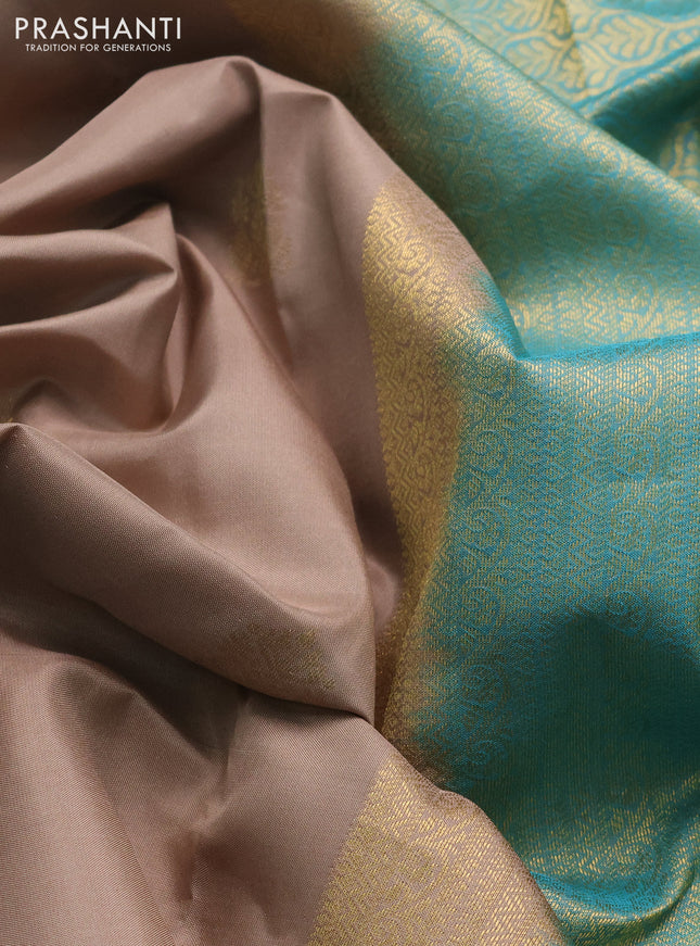 Pure kanchipuram silk saree beige and teal blue with allover zari woven buttas and rich zari woven border