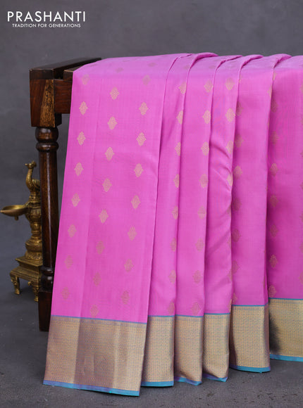 Pure kanchipuram silk saree lotus pink and dual shade of teal blue with allover zari woven buttas and rich zari woven border