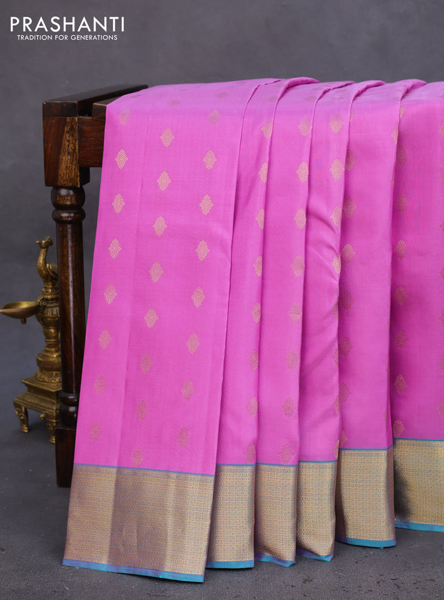 Pure kanchipuram silk saree lotus pink and dual shade of teal blue with allover zari woven buttas and rich zari woven border
