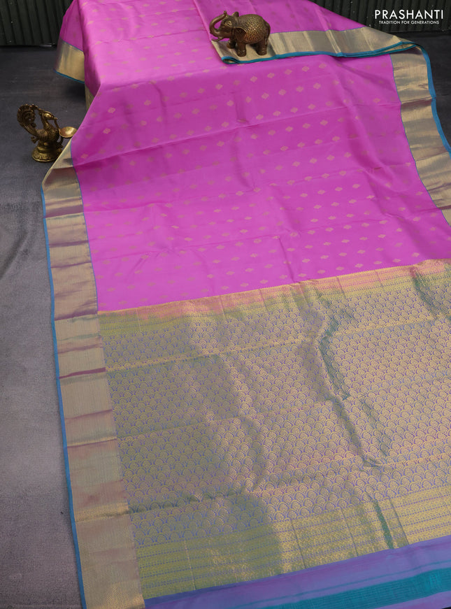 Pure kanchipuram silk saree lotus pink and dual shade of teal blue with allover zari woven buttas and rich zari woven border