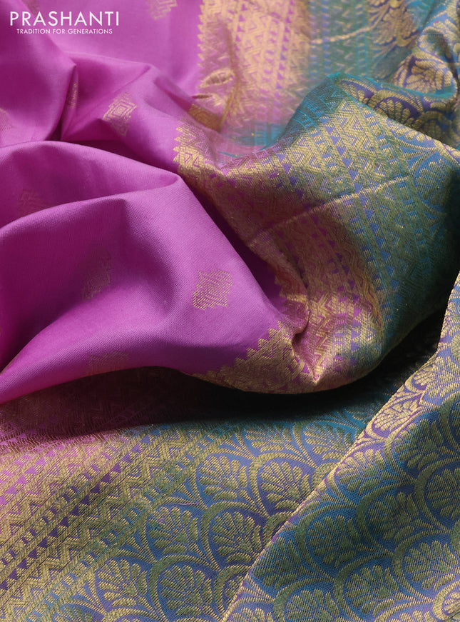 Pure kanchipuram silk saree lotus pink and dual shade of teal blue with allover zari woven buttas and rich zari woven border