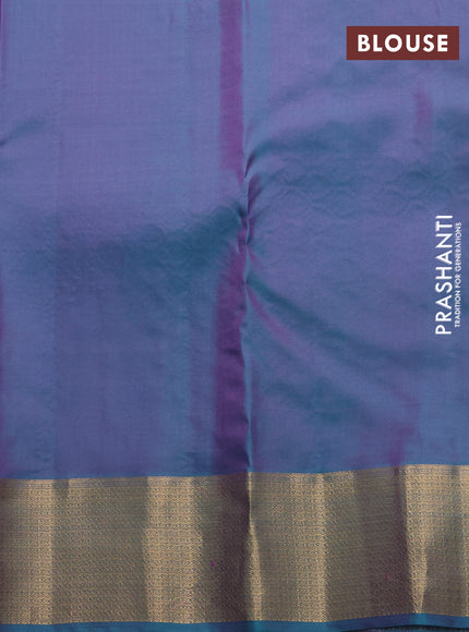 Pure kanchipuram silk saree lotus pink and dual shade of teal blue with allover zari woven buttas and rich zari woven border