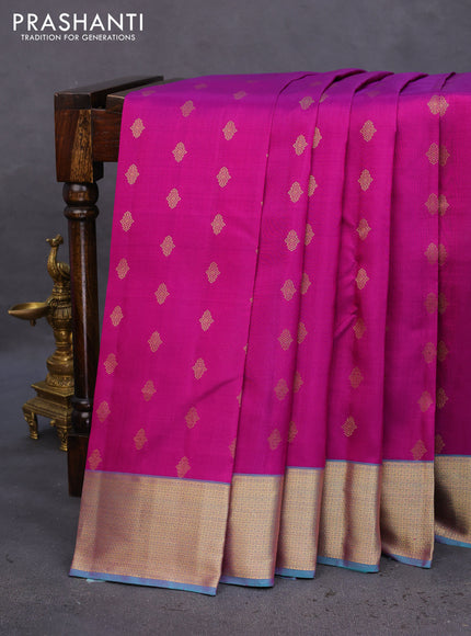 Pure kanchipuram silk saree purple and dual shade of teal green with allover zari woven buttas and rich zari woven border