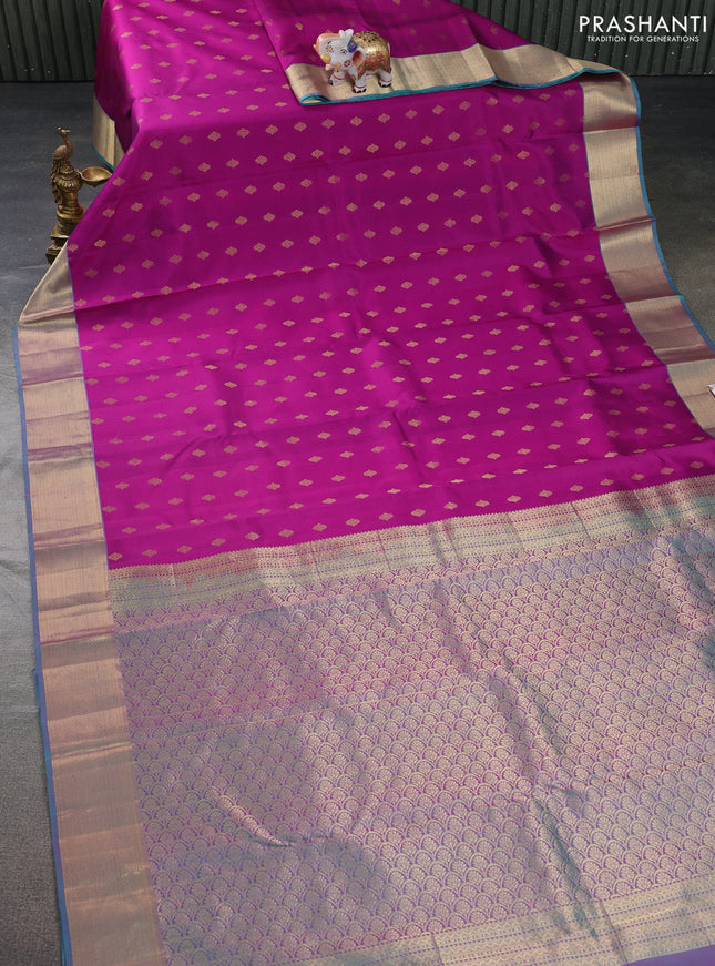 Pure kanchipuram silk saree purple and dual shade of teal green with allover zari woven buttas and rich zari woven border