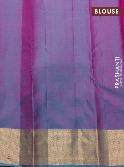 Pure kanchipuram silk saree purple and dual shade of teal green with allover zari woven buttas and rich zari woven border