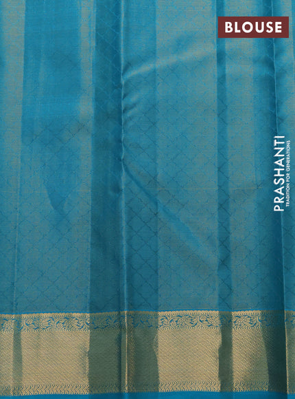 Pure kanchipuram silk saree black and teal blue with allover zari weaves and zari woven border