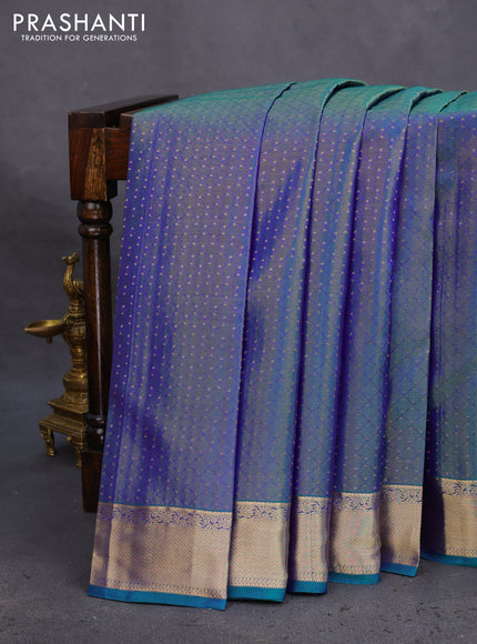 Pure kanchipuram silk saree dual shade of bluish green with allover zari weaves and zari woven border