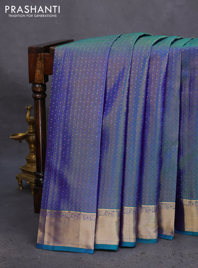 Pure kanchipuram silk saree dual shade of bluish green with allover zari weaves and zari woven border