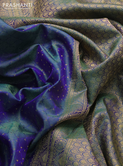 Pure kanchipuram silk saree dual shade of bluish green with allover zari weaves and zari woven border