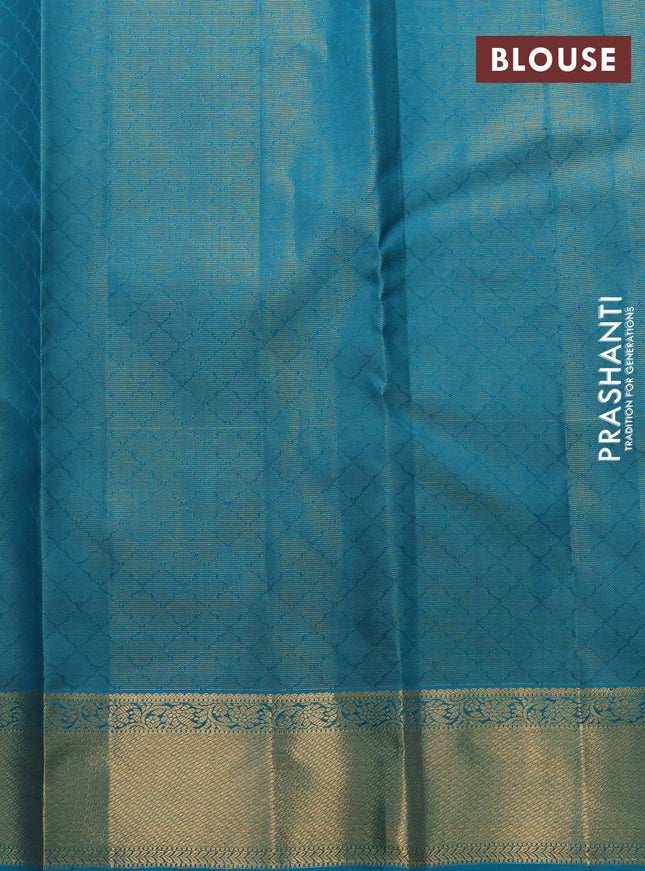 Pure kanchipuram silk saree dual shade of pink and teal blue with allover zari weaves and zari woven border