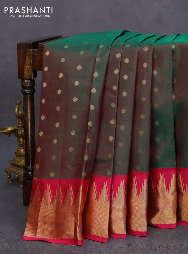 Pure kanchipuram silk saree dual shade of green and dark pink with allover zari woven buttas and temple design zari woven border