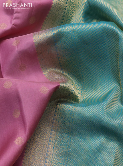 Pure kanchipuram silk saree mauve pink and teal green with allover zari woven buttas and temple design zari woven border