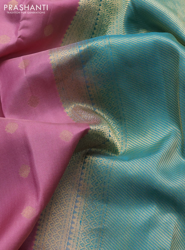 Pure kanchipuram silk saree mauve pink and teal green with allover zari woven buttas and temple design zari woven border