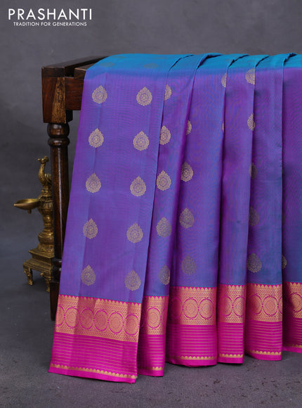 Pure kanchipuram silk saree dual shade of bluish purple and purple with allover zari woven buttas and zari woven border
