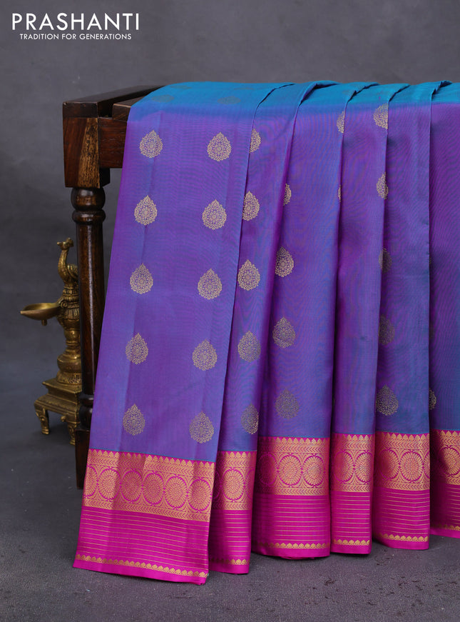 Pure kanchipuram silk saree dual shade of bluish purple and purple with allover zari woven buttas and zari woven border