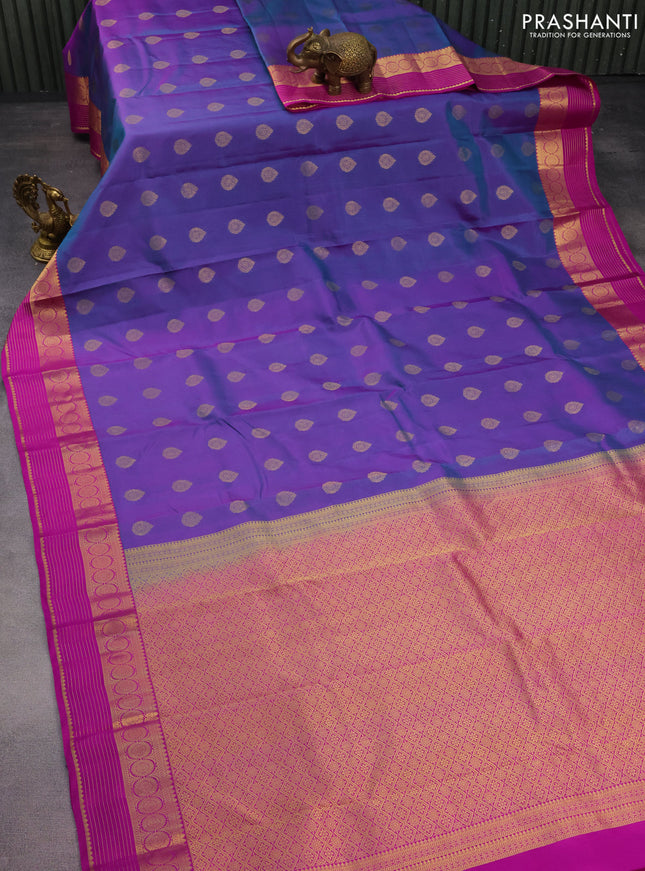 Pure kanchipuram silk saree dual shade of bluish purple and purple with allover zari woven buttas and zari woven border