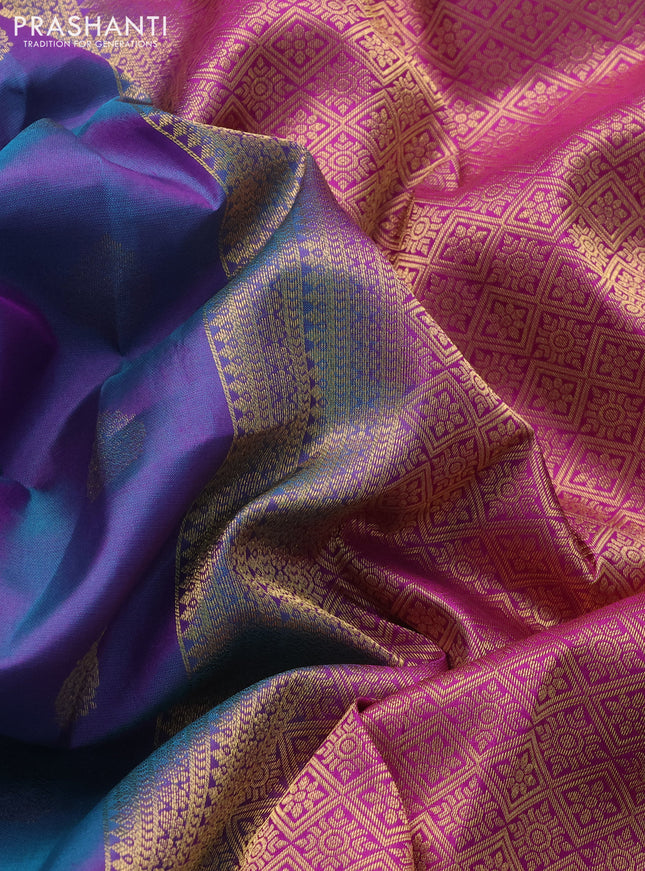 Pure kanchipuram silk saree dual shade of bluish purple and purple with allover zari woven buttas and zari woven border