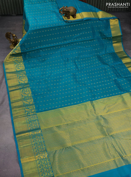 Pure kanchipuram silk saree teal blue with allover zari woven buttas and rich zari woven border
