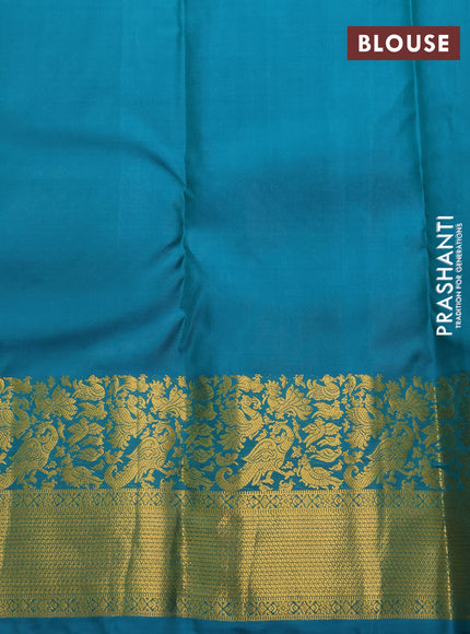 Pure kanchipuram silk saree teal blue with allover zari woven buttas and rich zari woven border