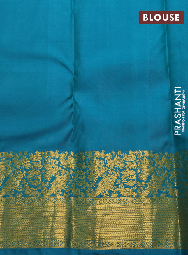 Pure kanchipuram silk saree teal blue with allover zari woven buttas and rich zari woven border