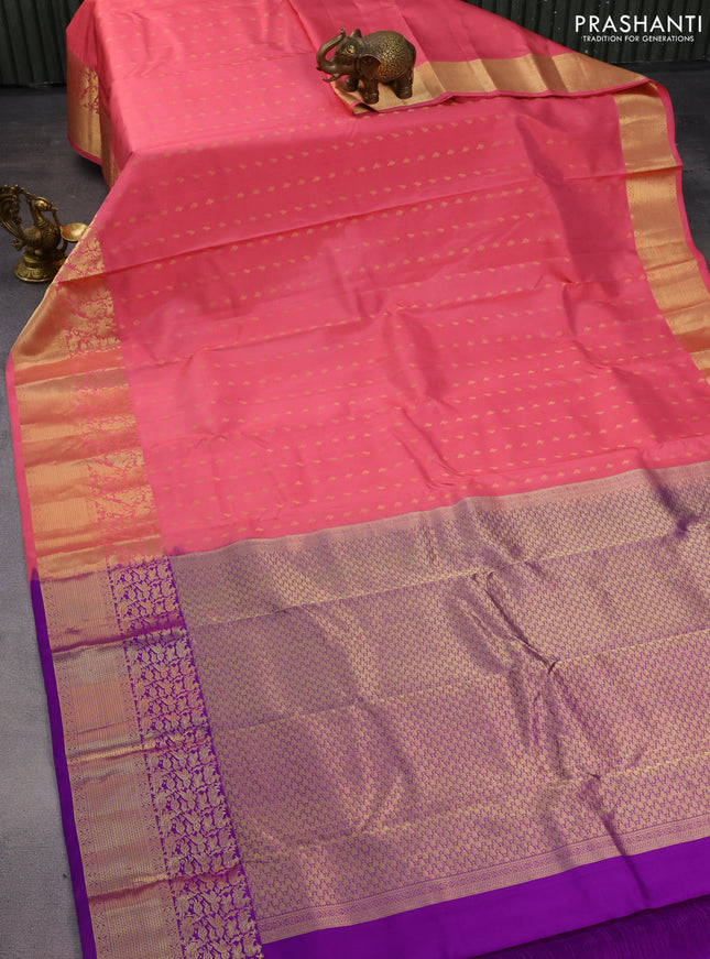 Pure kanchipuram silk saree peach pink and violet with allover zari woven buttas and rich zari woven border