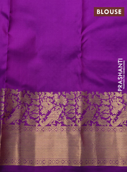 Pure kanchipuram silk saree peach pink and violet with allover zari woven buttas and rich zari woven border